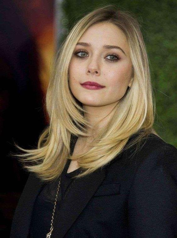 Warum wird schulternahes Haar oft bevorzugt?